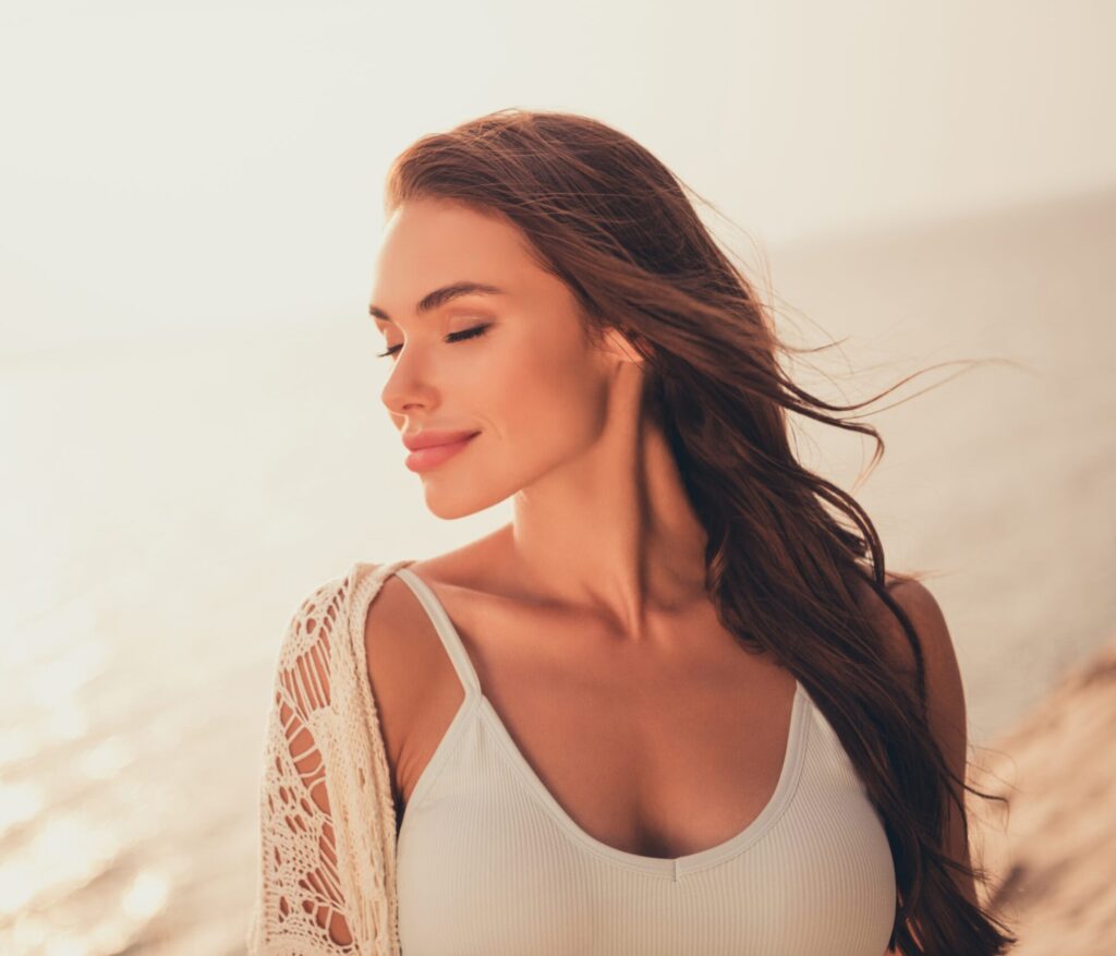 Young woman showing toned figure after facelift surgery recovery with Dr. John Diaz in Beverly Hills, Los Angeles