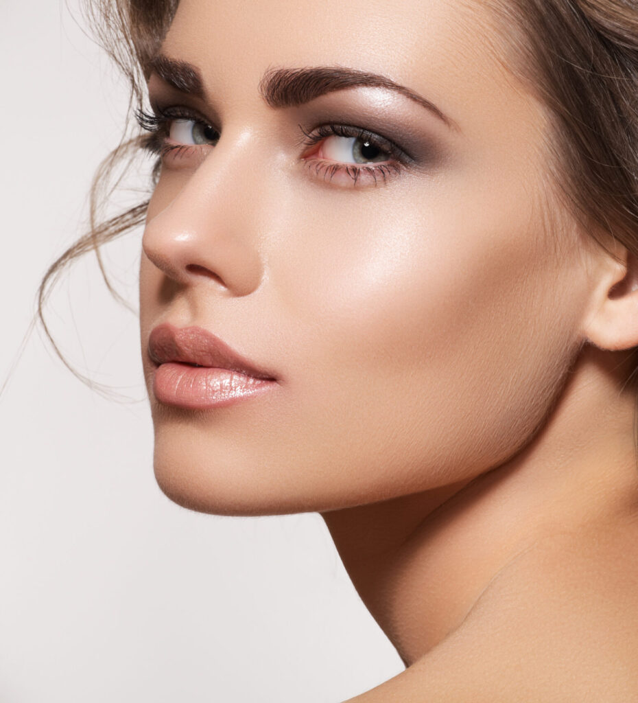 Young woman showing toned figure after eyelid surgery blepharoplasty recovery with Dr. John Diaz in Beverly Hills, Los Angeles