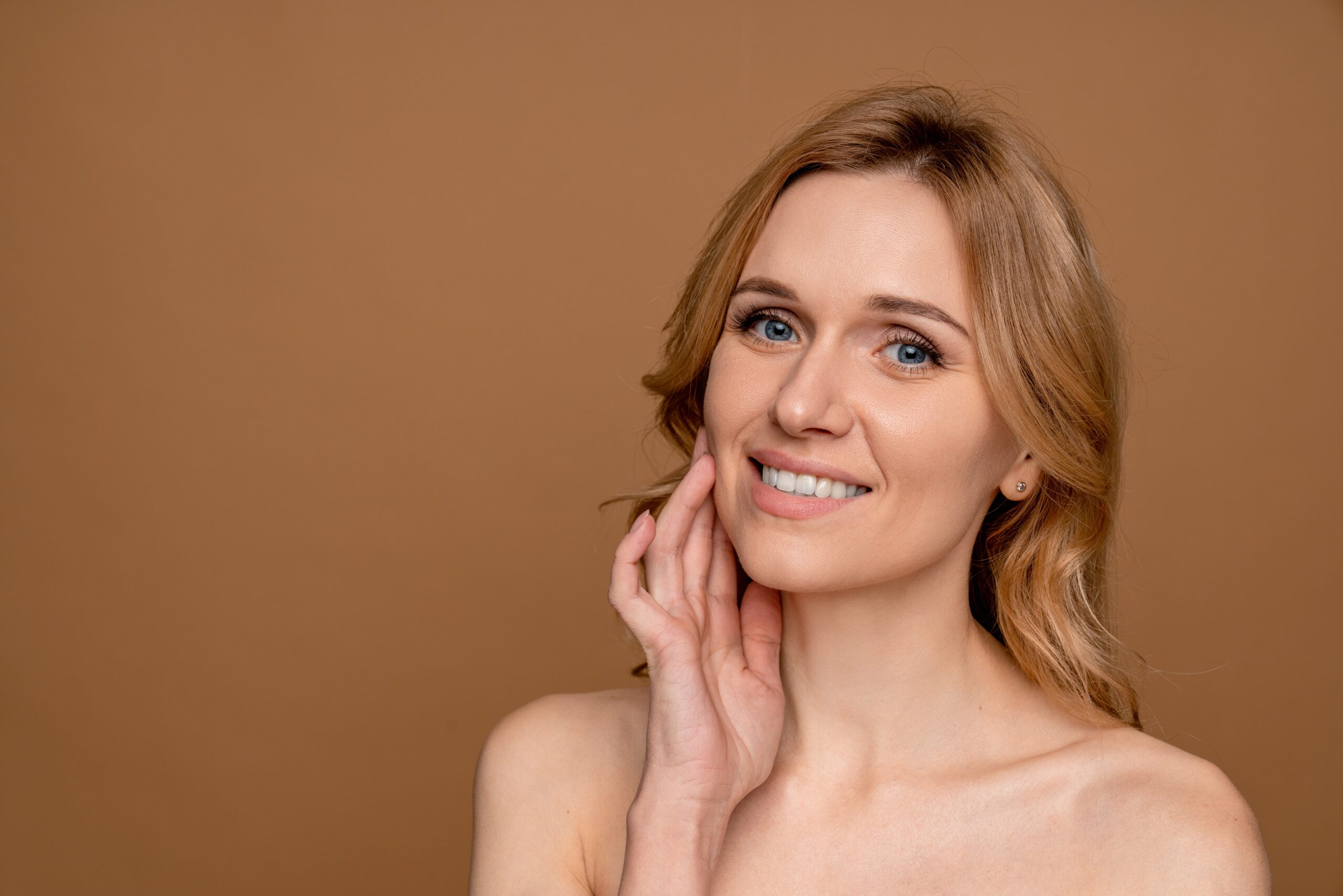 young woman with clear skin after cosmelan laser treatment 